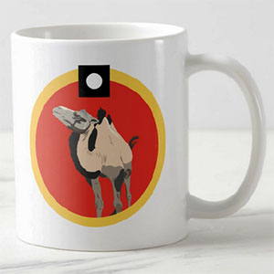 photo of a white mug with an illustration of a camel on it